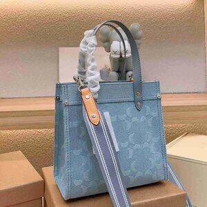 Coach Field Tote 22 In Signature Denim (Light Blue) CJ853
